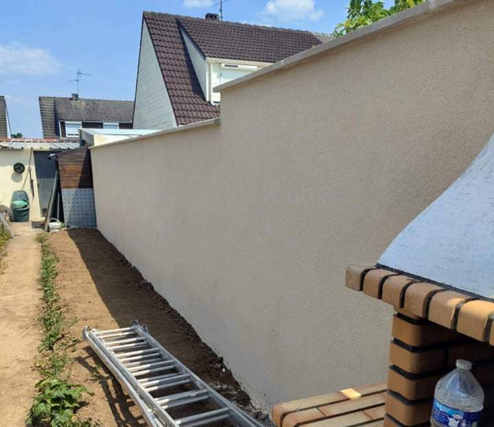 Travaux de maçonnerie paysagère pour une touche finale